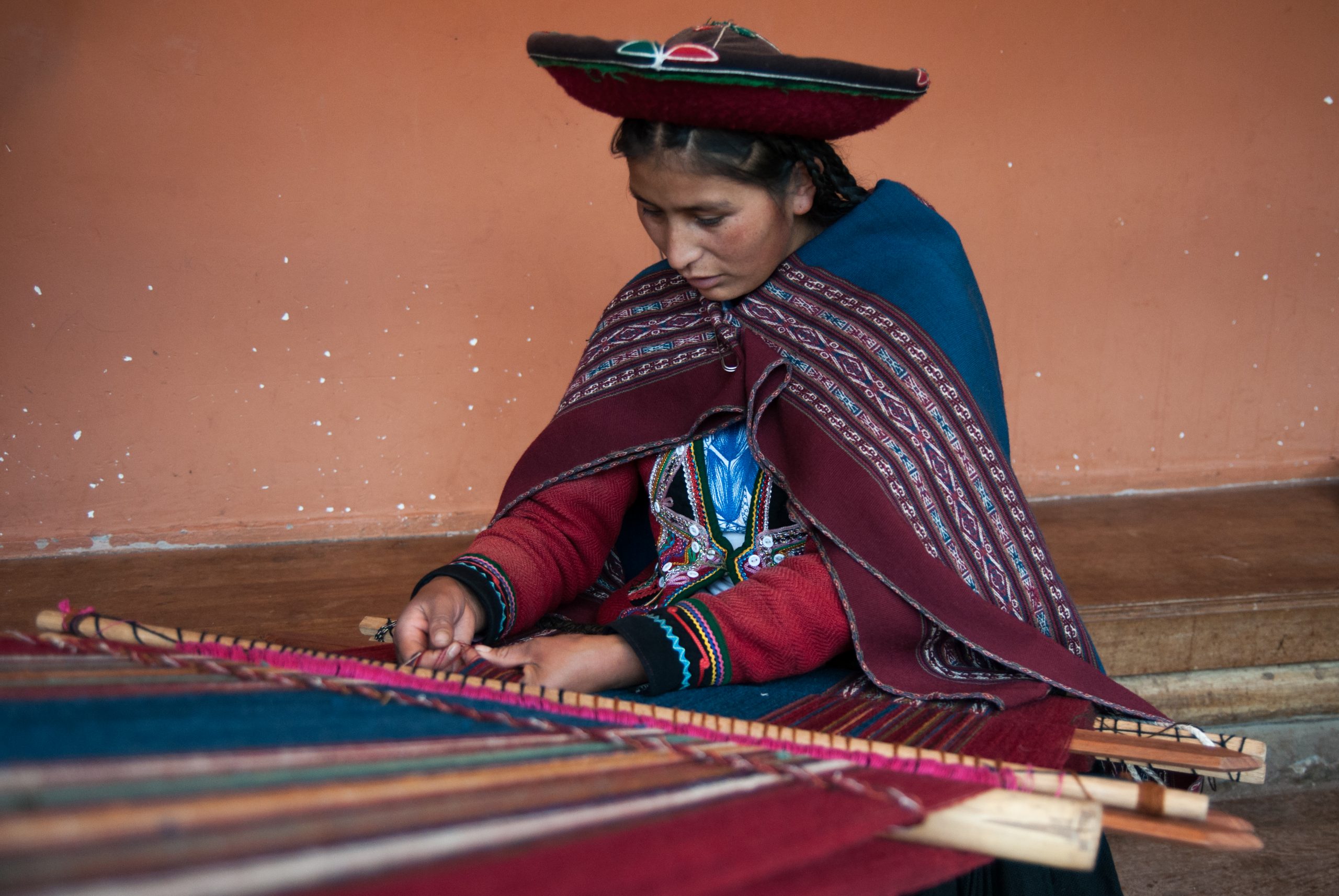 Andean women weaving traditional textiles in Cusco